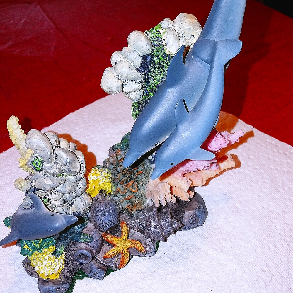 Dolphins at play Resin sculpture